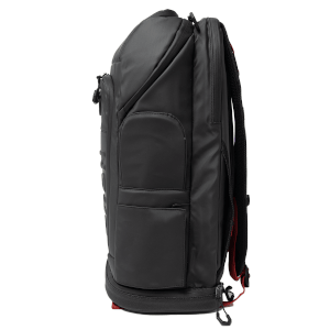 Side view of a black backpack with multiple zippered compartments and padded straps.