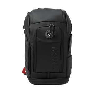 Front view of a black backpack with a circular "MAGNETIC" emblem and raised "CRBN" lettering.