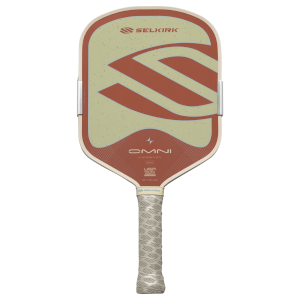 Front view of a Selkirk Omni pickleball paddle with red stripes on a tan speckled surface and the Selkirk logo.