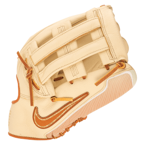 Corner view of a cream Nike baseball glove with a copper Nike swoosh and striped sole.