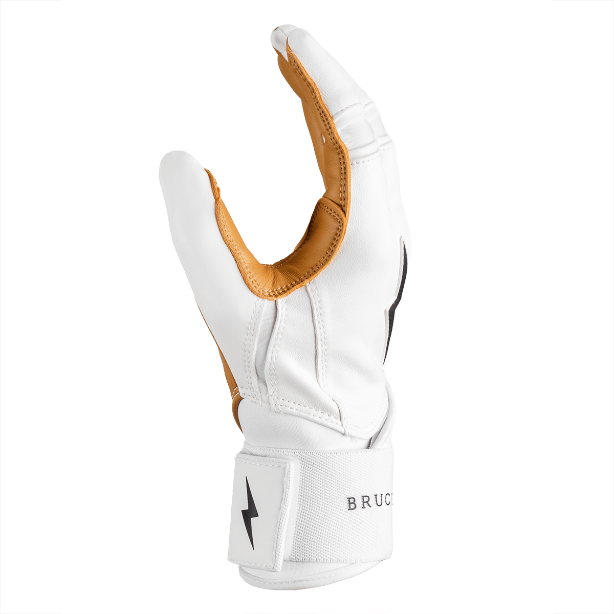 Side view of a white batting glove with tan leather accents, showing the word "BRUC" on the wrist strap.