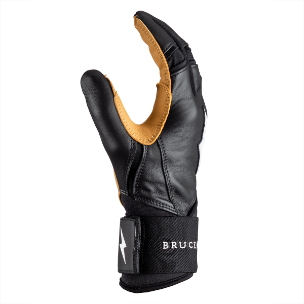 Side view of a black leather glove with tan accents, a white lightning bolt logo, and "BRUCE" text on the strap.