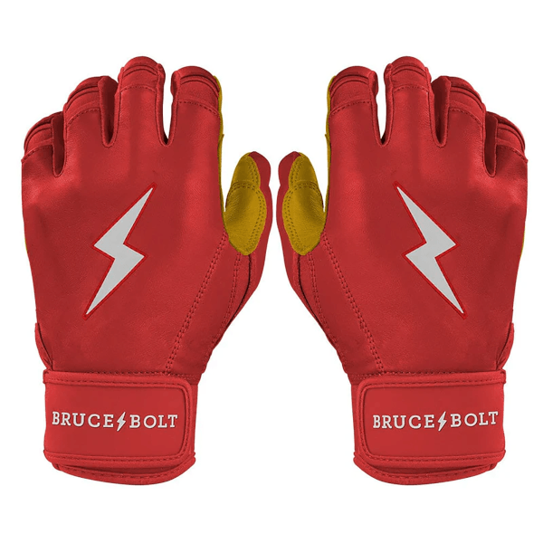 Front view of red batting gloves with yellow accents, white lightning bolt logos, and "BRUCE BOLT" text on the wrist straps.