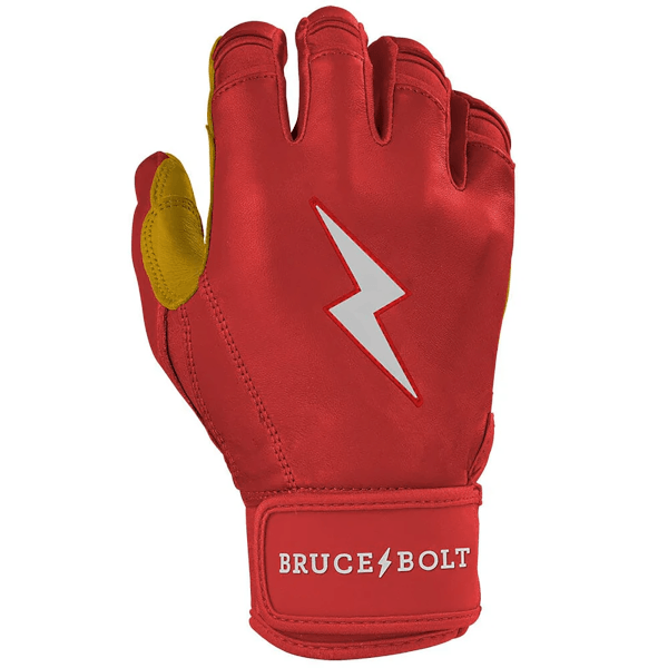Front view of a red batting glove with yellow accents, a white lightning bolt logo, and "BRUCE BOLT" text on the wrist strap.