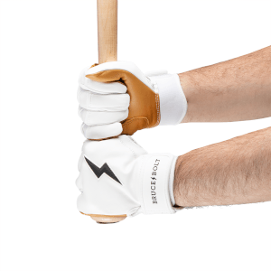 Side view of hands wearing white batting gloves with brown accents and the BRUCE BOLT logo.