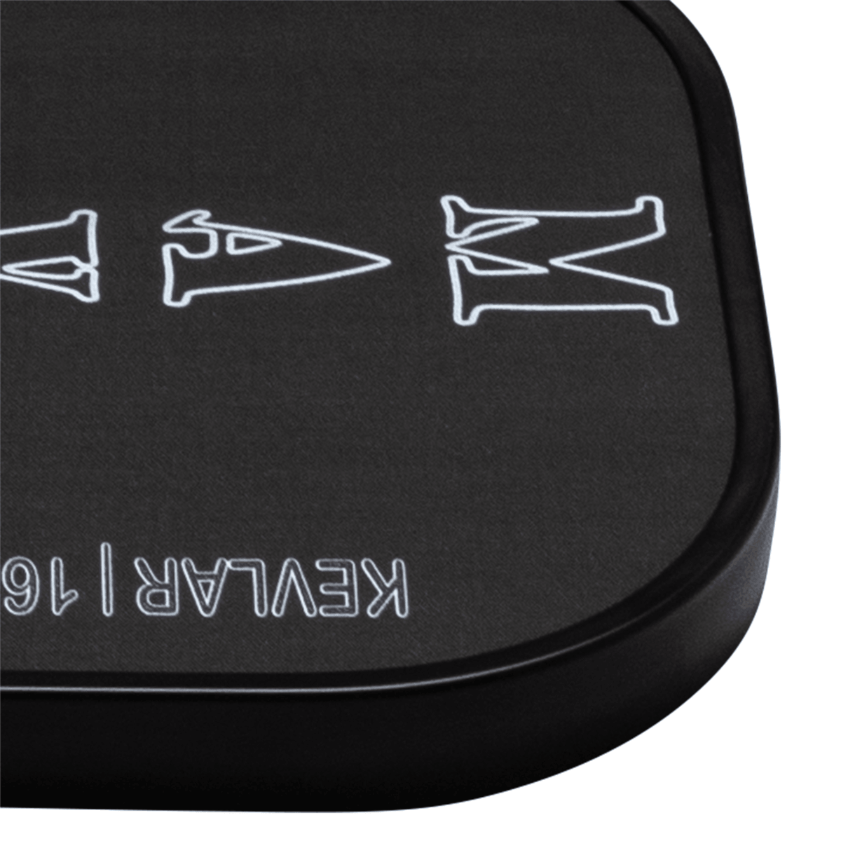 Corner view of the Dymon Mayhem paddle showing white lettering "MAYHEM" and "KEVLAR | 16".