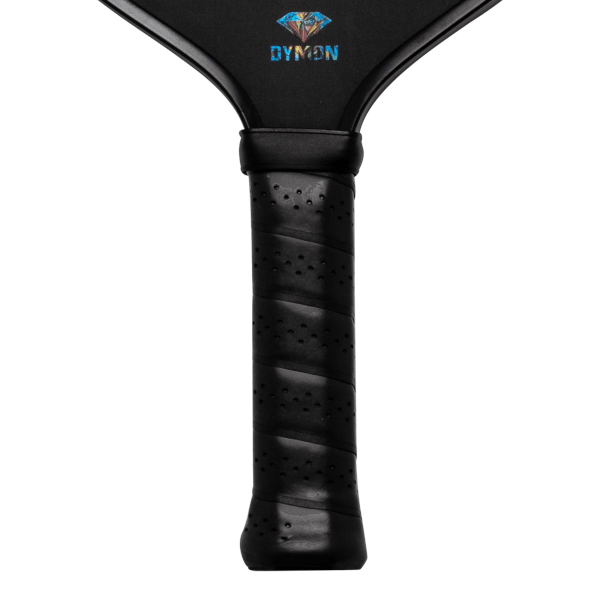 Top-down view of the Dymon Mayhem paddle handle with a black grip and the Dymon logo.