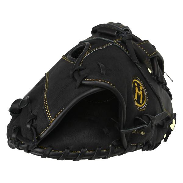 Front view of a black first base mitt with gold stitching and an M logo.
