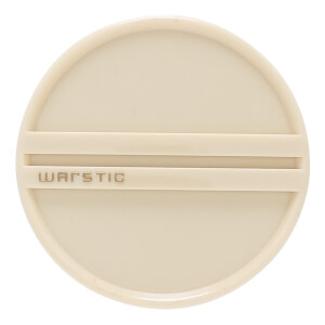 Top-down view of a cream circular bat end cap with two horizontal raised lines and embossed WARSTIC text.
