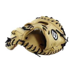 Side view of a tan Wilson A2000 catchers mitt with black lacing and a black W logo.