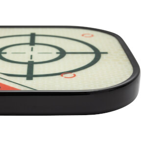 Corner view of a white pickleball paddle with a black edge and target design.