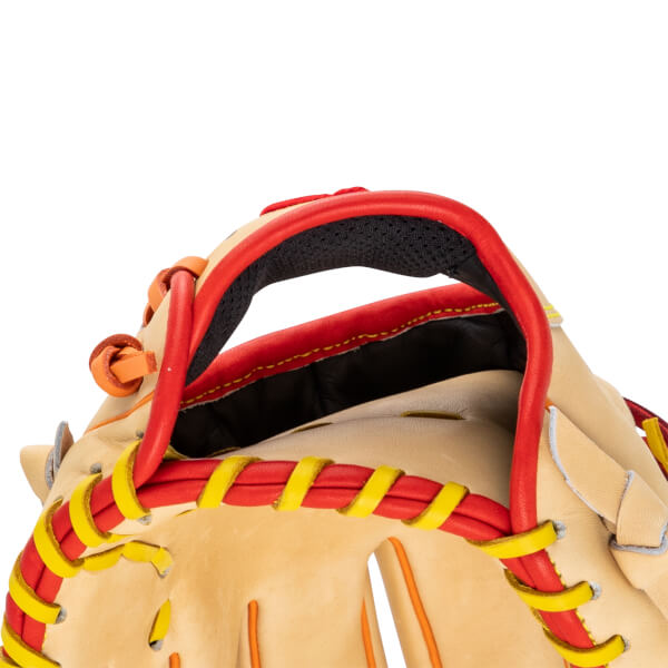 Top-down view of a tan baseball glove with red and yellow lacing and a padded wrist strap.