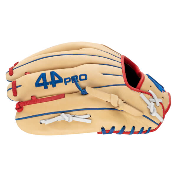 Side view of a tan baseball glove with blue "44 PRO" lettering, red and blue lacing, and white finger loops.