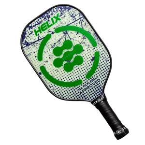 Top-down view of a white pickleball paddle with green circular graphics, HELIX text, and USA PICKLEBALL APPROVED text.