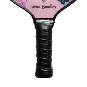 Close-up of a black pickleball paddle grip with Baddle logo and pink Vera Bradley patterned head.