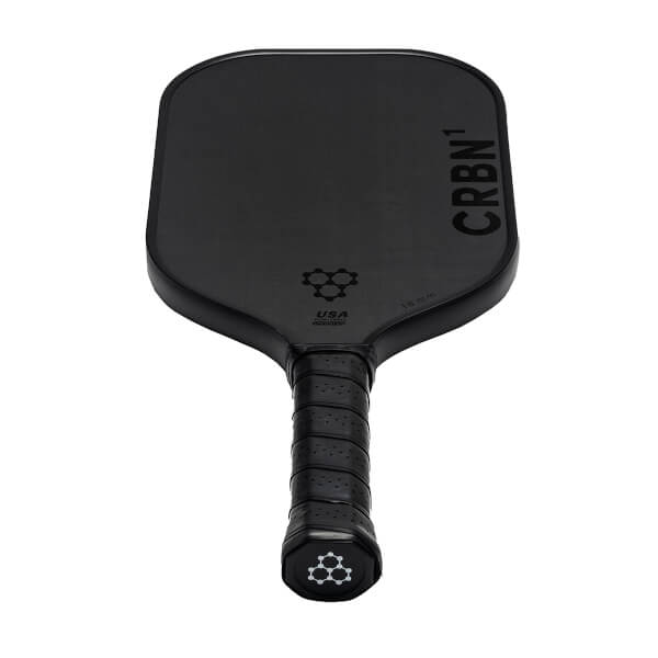 Top-down view of a black pickleball paddle with CRBN¹ branding and a honeycomb logo.