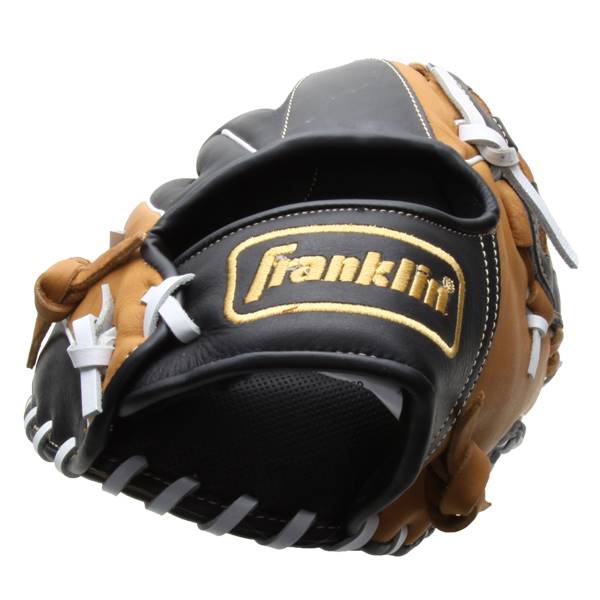 Close-up of a black and tan baseball glove with Franklin logo and white stitching.