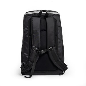Back view of a black pickleball backpack with padded shoulder straps and a sternum strap.