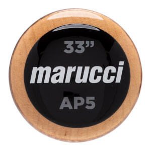 Top-down close-up of a natural wood baseball bat barrel with a black circular insert displaying marucci, 33, and AP5.