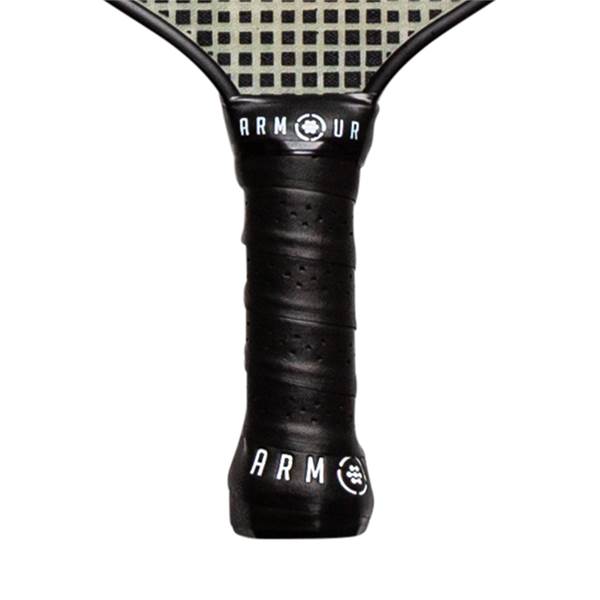 Close-up of a black pickleball paddle grip with ARMOUR and ARM logos.