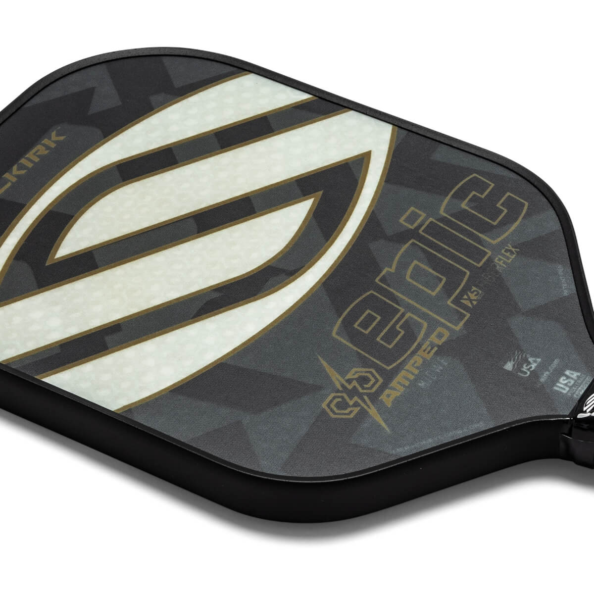 Corner view of a black pickleball paddle with a large white S graphic, gold epic text, and camouflage pattern.
