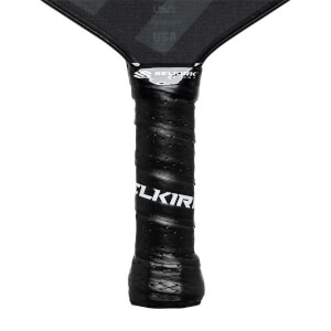 Close-up of a black pickleball paddle grip with SELKIRK and USA visible.