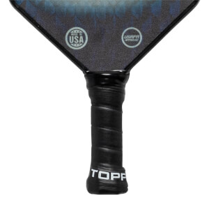Top-down view of a black pickleball paddle with MADE IN USA and USAPA APPROVED logos and TOPP branding on the grip.