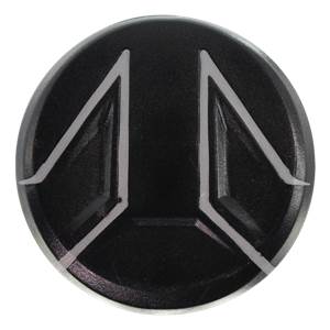 Top-down view of a black baseball bat end cap with a silver geometric design.
