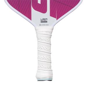 Close-up of a white pickleball paddle grip with perforations and USA Pickleball Approved logo.