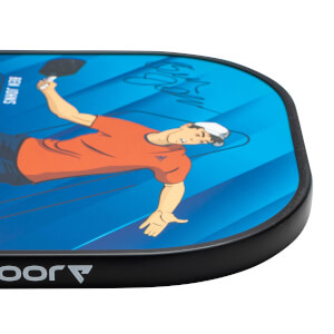 Corner view of a blue pickleball paddle with a graphic of Ben Johns and JOOLA branding.