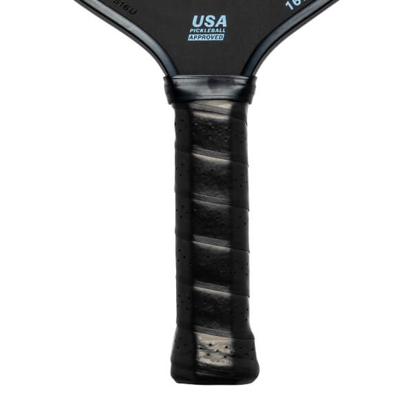 Close-up of a black pickleball paddle grip with USA Pickleball Approved text.