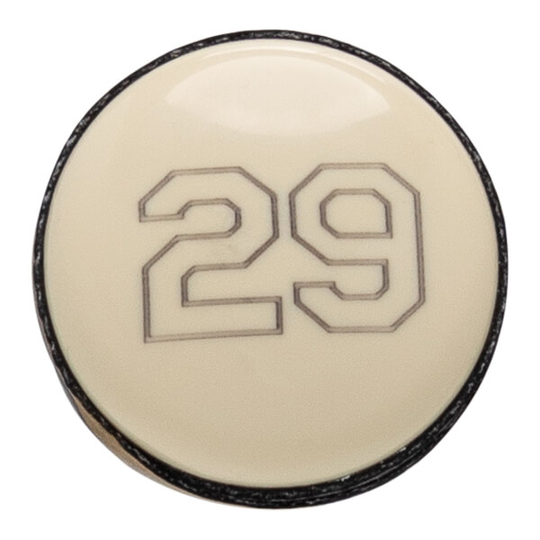 Close-up of an off-white baseball bat end cap with a black rim and the number 29 outlined in the center.