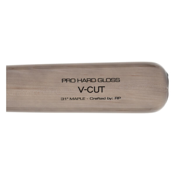 Close-up of a light brown wood baseball bat showing PRO HARD GLOSS V-CUT and 31 MAPLE text.