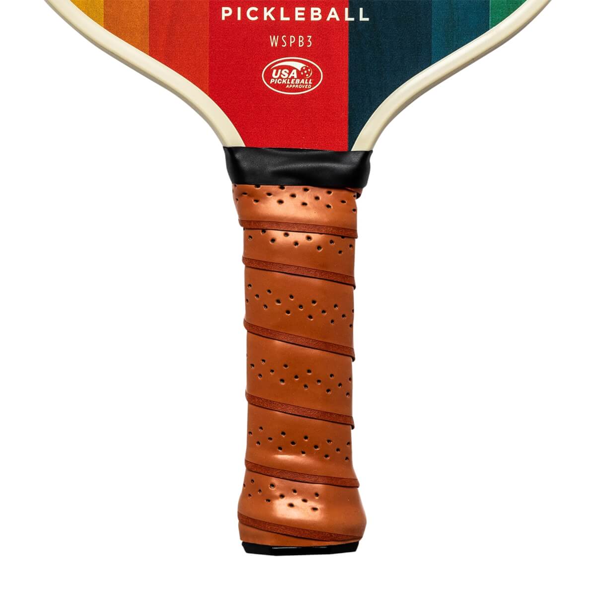 Close-up of a brown pickleball paddle grip with perforations and a rainbow-striped head with PICKLEBALL and WSPB3 text.