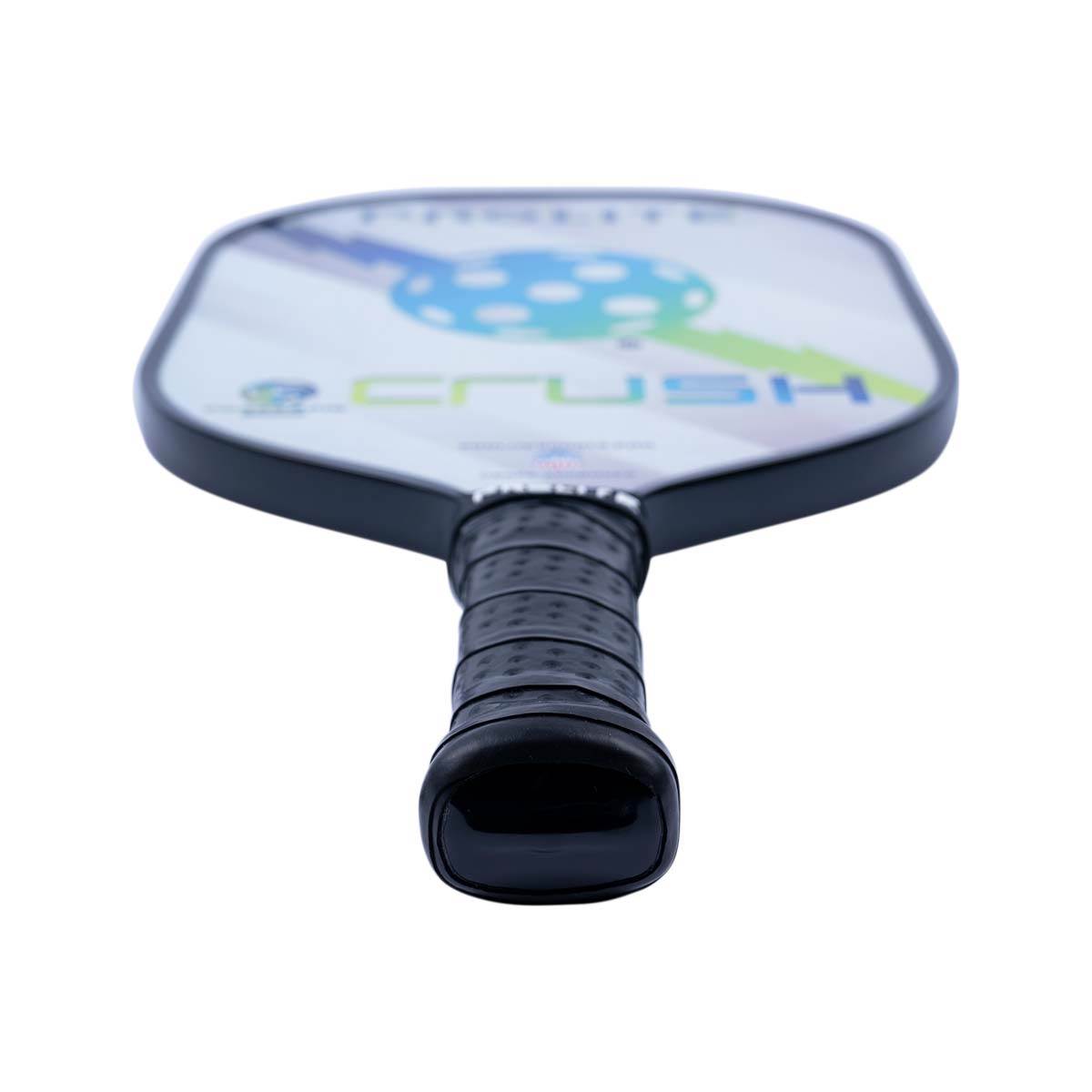 Top-down view of a white pickleball paddle with a black grip and CRUSH text.