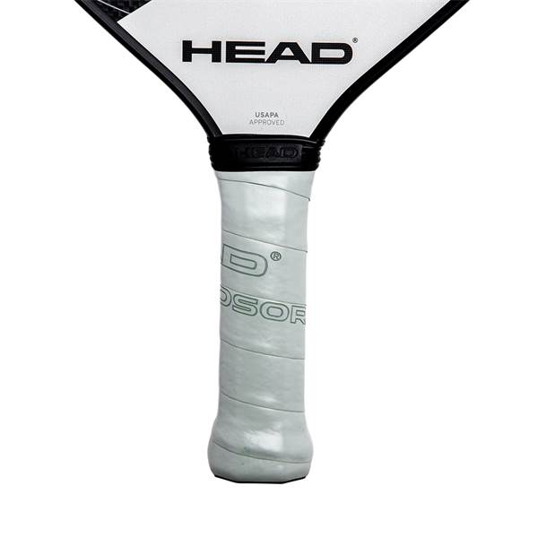 Close-up of a white pickleball paddle grip with embossed HEAD logo and USAPA approved stamp.
