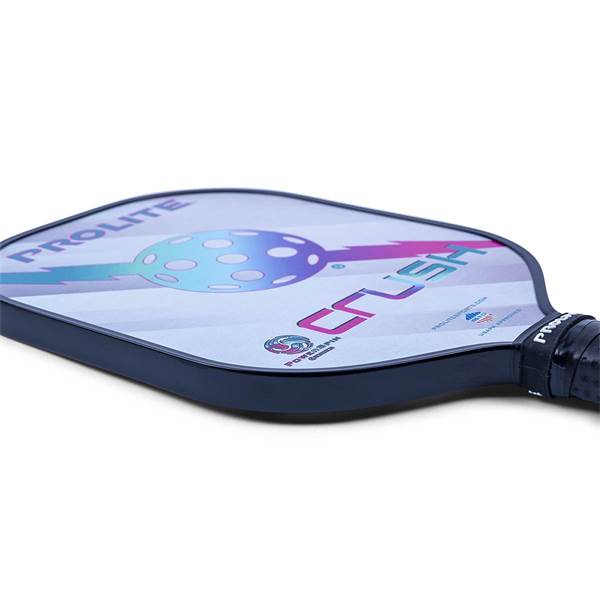 Side view of a blue pickleball paddle with PROLITE and CRUSH text and a colorful graphic.