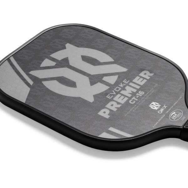 Corner view of a black pickleball paddle with EVOKE PREMIER CT-16 text and a large grey logo.