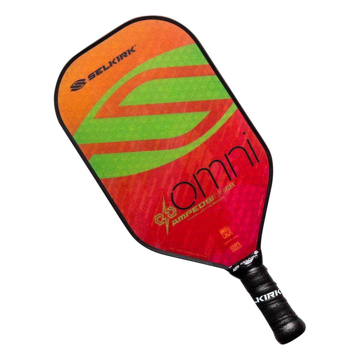 Top-down view of an orange and red pickleball paddle with green wavy stripes and OMNI text.