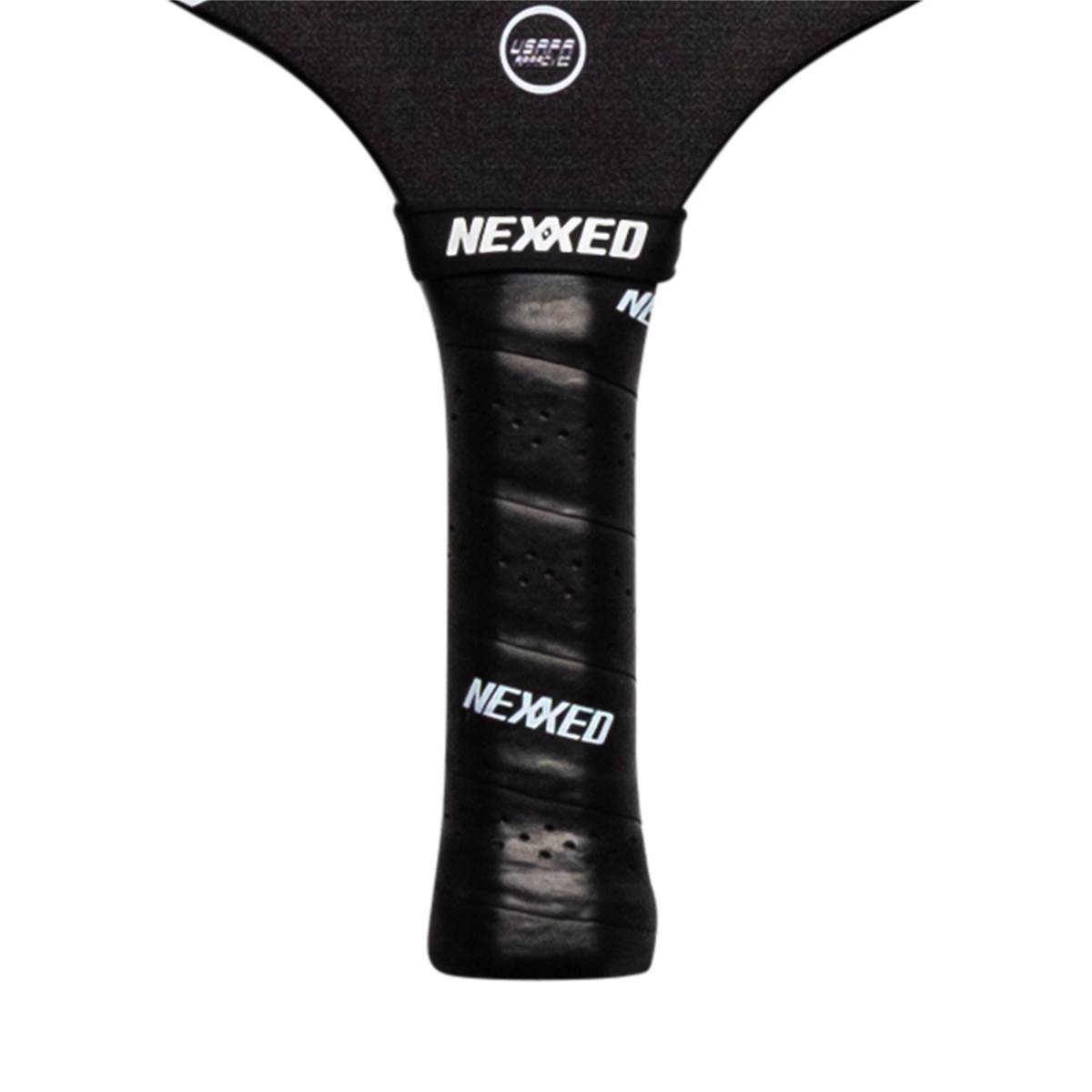 Close-up of a black pickleball paddle grip with perforated texture and white Nexxed branding.