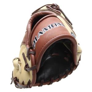 Top-down view of a tan and brown baseball glove with DIAMOND text and dark interior.