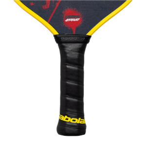 Close-up of a black pickleball paddle grip with yellow babolat text and USAPA APPROVED graphic.