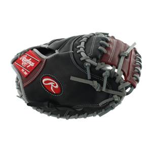 Top-down view of a black and red catchers mitt with Rawlings logo and Est. 1887 text.