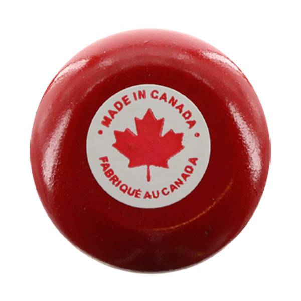 End view of a red baseball bat with a Made in Canada sticker featuring a red maple leaf.