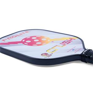 Side view of a white pickleball paddle with PROLITE and CRUSH text, and a pink and yellow graphic.