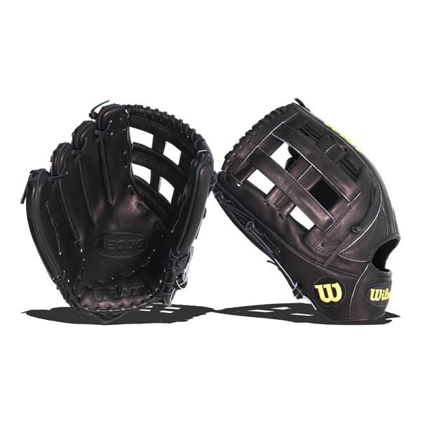 Two black baseball gloves with white stitching and yellow Wilson logos.