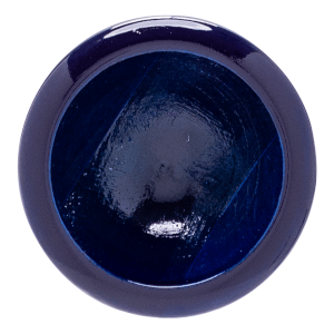 Top-down view of a dark blue bowl with a textured interior and a glossy rim.