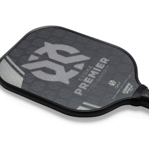 Corner view of a black pickleball paddle with EVOKE PREMIER text and a large grey logo.