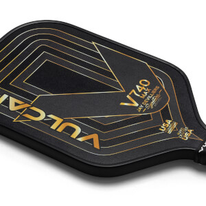 Corner view of a black Vulcan V740 Max pickleball paddle with gold geometric lines, VULCAN text, and USA PICKLEBALL APPROVED text.