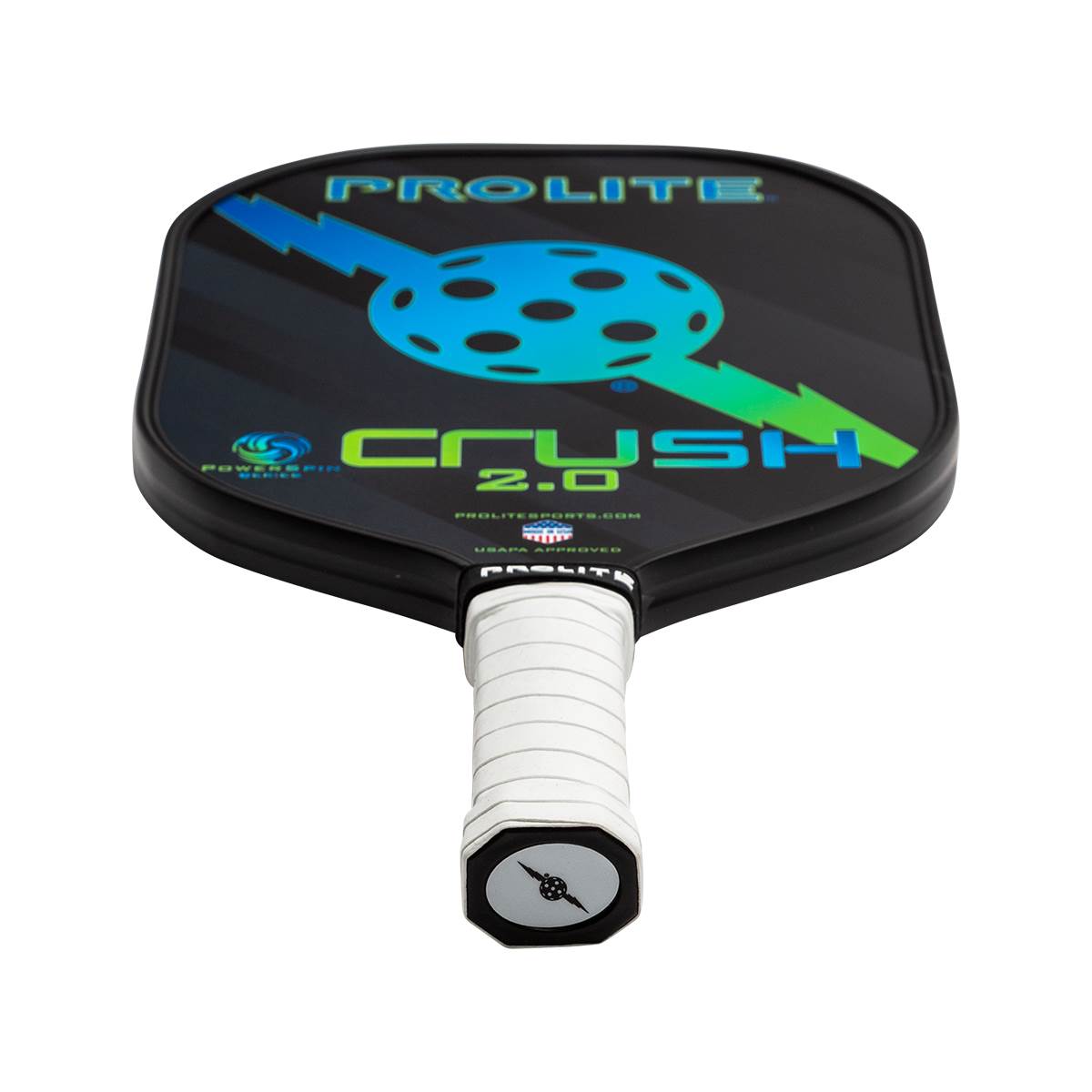 Top-down view of a black PROLITE Crush PowerSpin 2.0 paddle with a blue and green lightning bolt design and white grip.